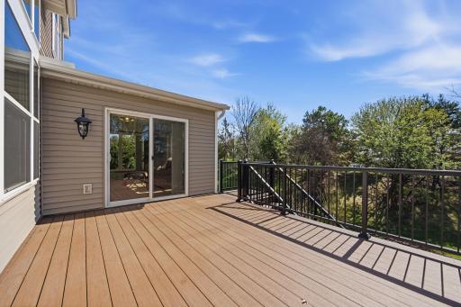 The newly constructed 14' x 16' backyard deck offers a maintenance-free outdoor living space