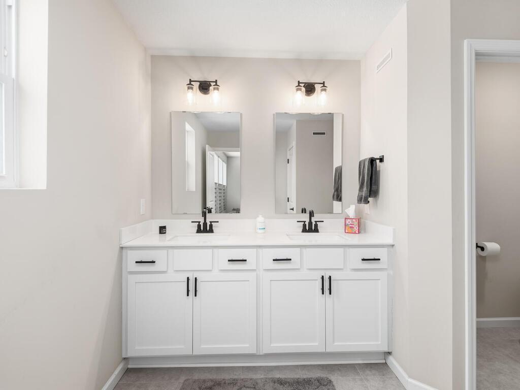 Double vanity with good storage.