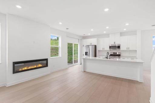 Sharing space with the kitchen, the modern dining area is great for serving piping-hot meals during intimate family dinners and holiday parties.