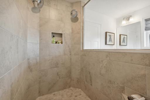 (Photo of a decorated model, actual homes finishes will vary) An up-close view of the serenity shower.