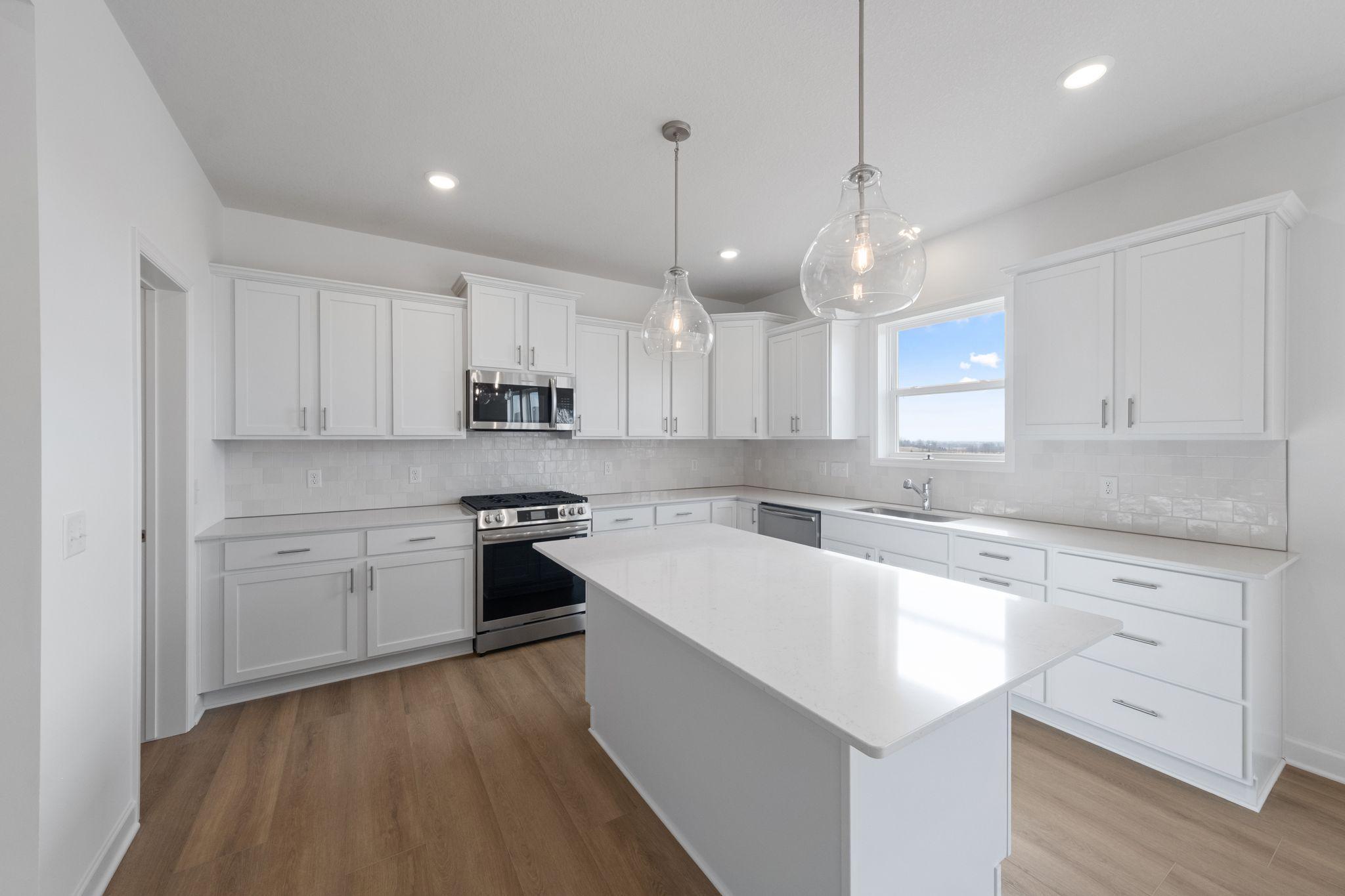 (All the following photos are of a similar home, actual finishes may vary.)