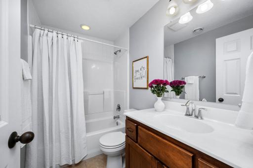 An additional lower level full bathroom adds convenience for guests and everyday living.