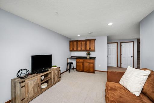 The professionally finished lower level offers a dry bar for hosting family and friends or an extra place to study.