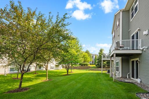 Beautifully maintained outdoor area offers room to relax, play, or simply enjoy the outdoors.