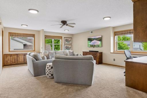 Upper level family room/loft offers flexible living space