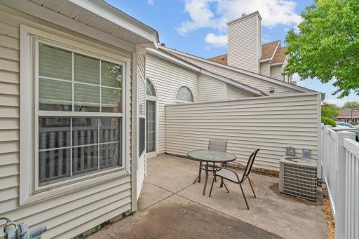Enjoy early spring sunshine on private patio with your morning coffee