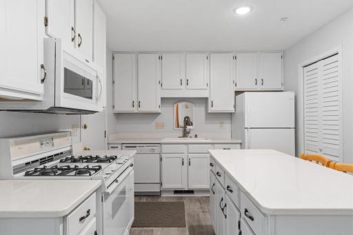 Abundance of white cabinetry & white appliances
