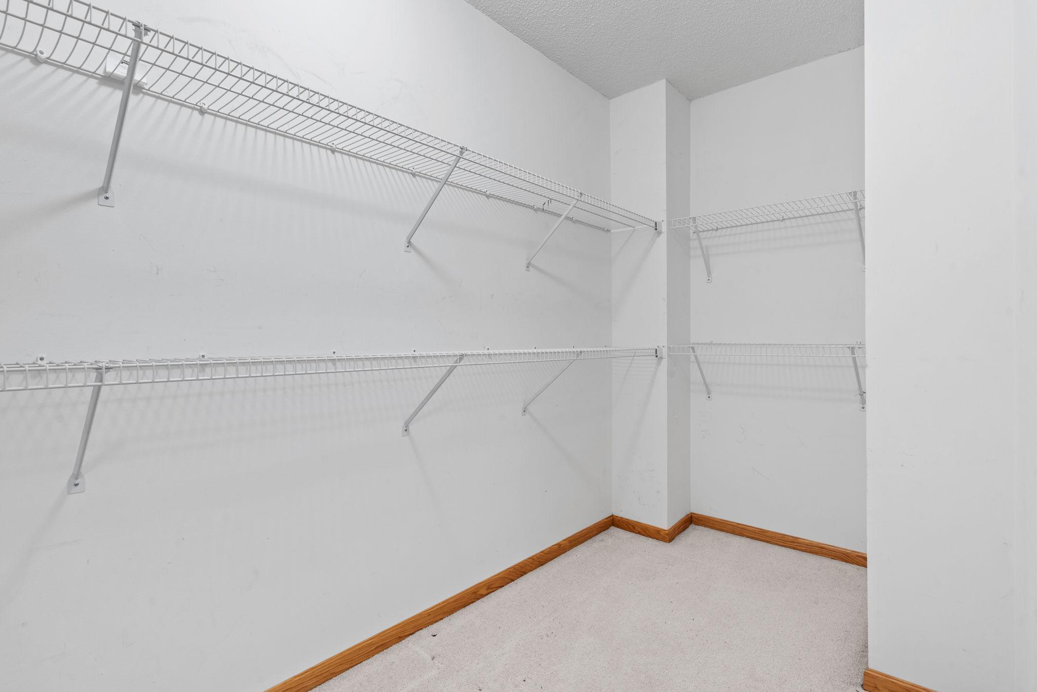 Extra spacious walk in closet is a bonus for your seasonal clothes