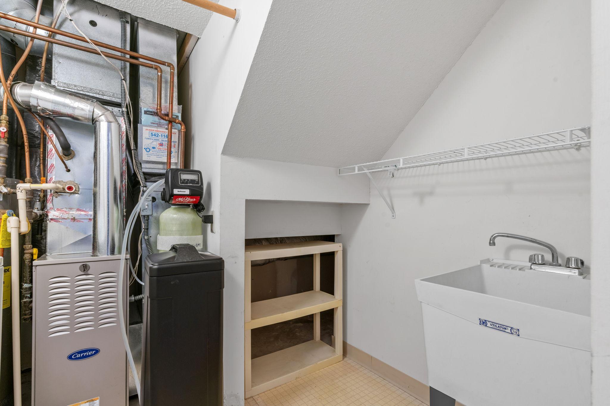 Mechanical room with large laundry tub