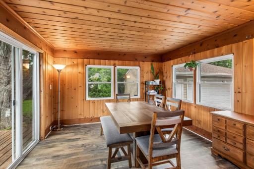 Three-season porch with slider that leads to deck
