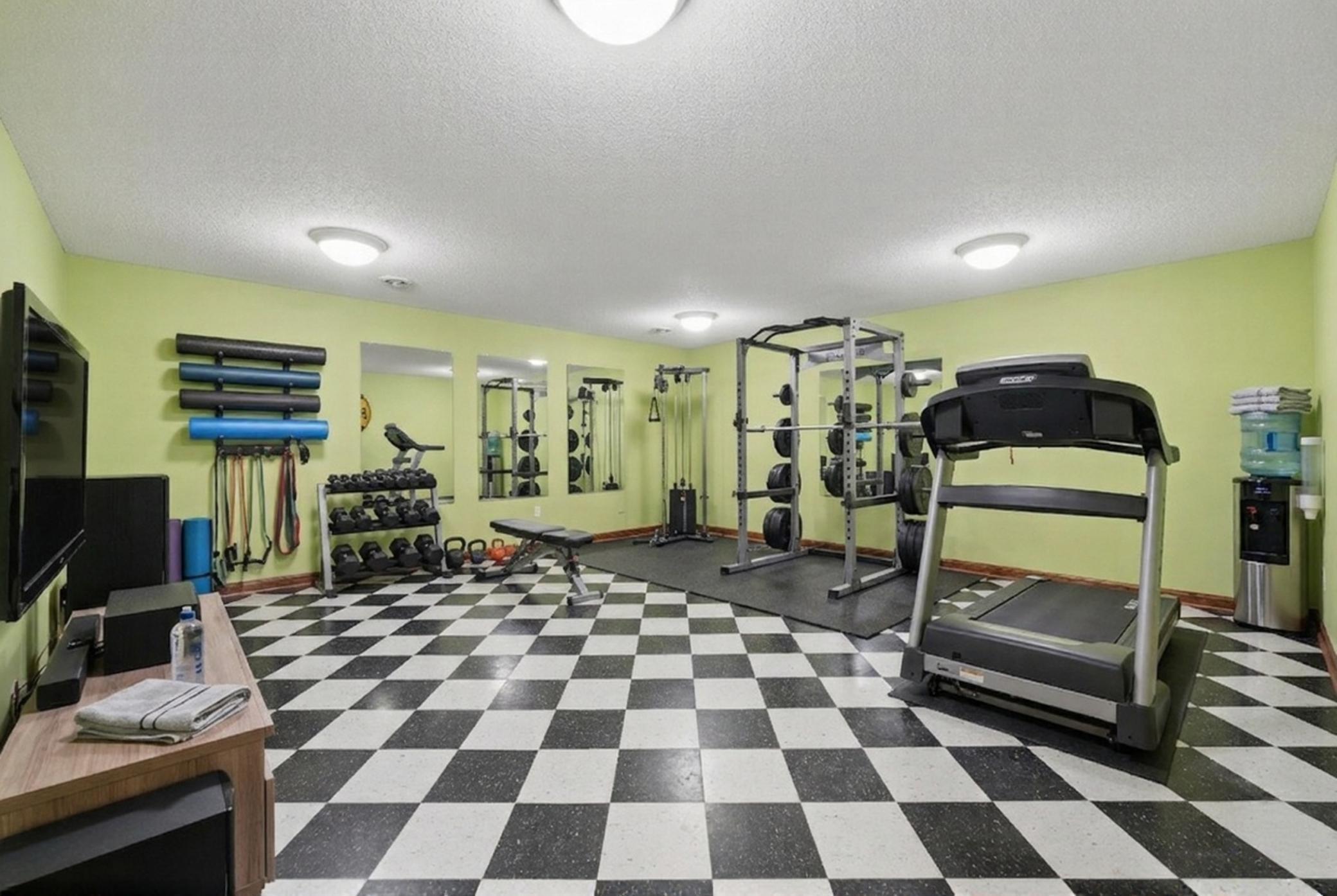 Virtually staged to be an exercise room, the train room has many options. Roomy for a hobby or anything else your have been thinking about!