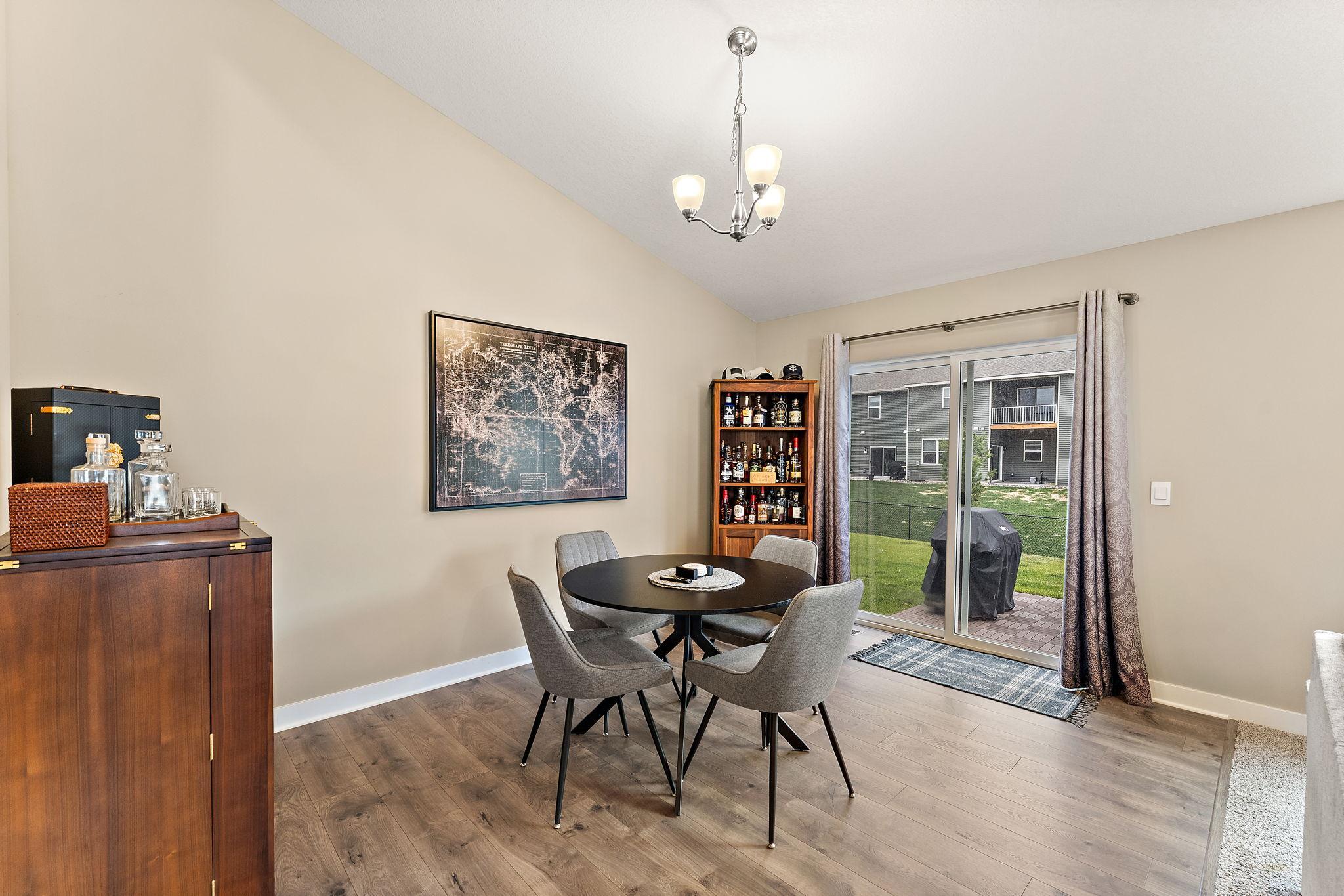 Dining Room w/ Back Patio Walkout