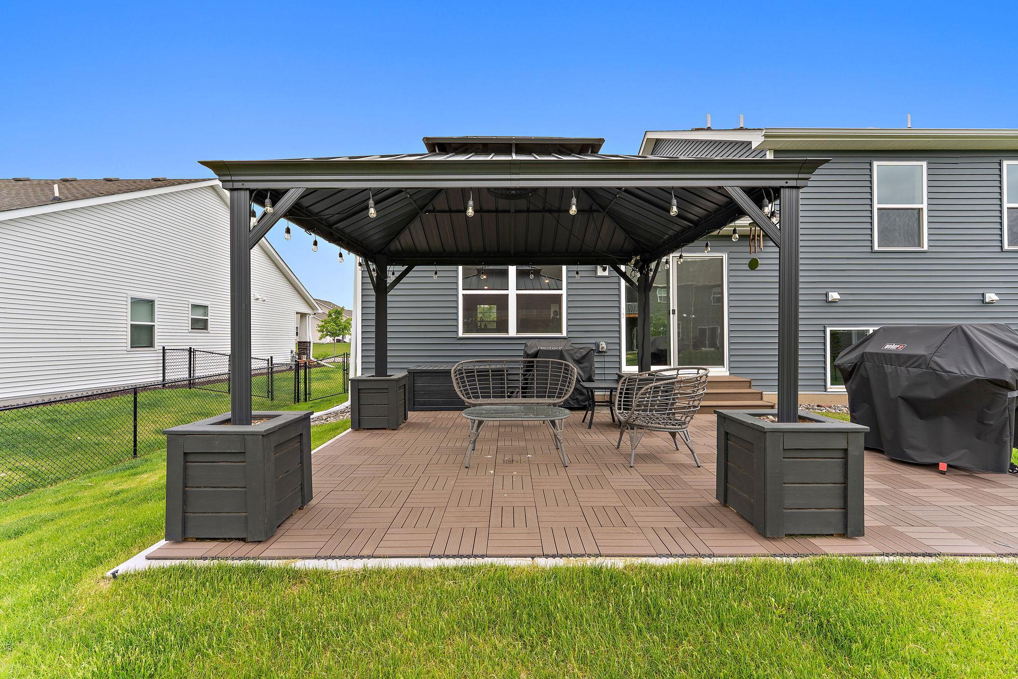 Pergola w/ string lights conveys!