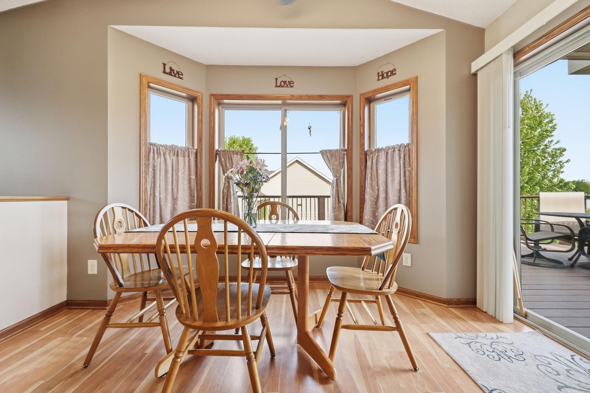 Dining space opens to deck