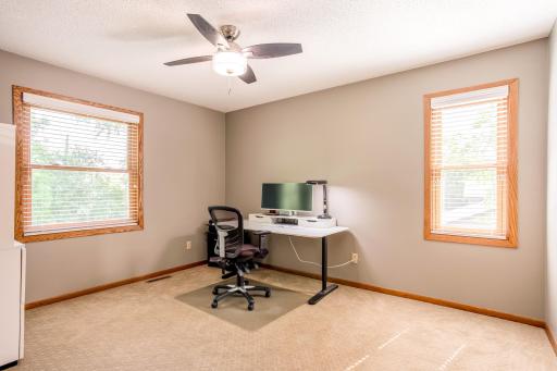 A spacious secondary bedroom offers flexibility for guests, family, or a home office.