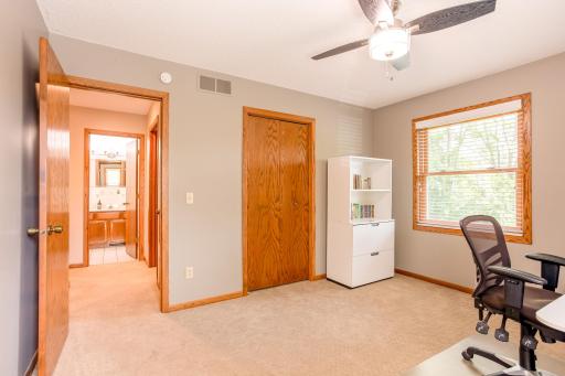 Bright and versatile, this bedroom provides ample space for work, study, or everyday living.
