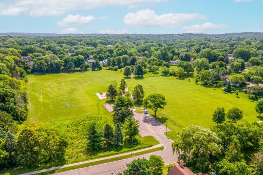 Enjoy an unbeatable location directly across from Highland View Park, offering expansive green space, playgrounds, trails, and athletic fields just steps from your front door.