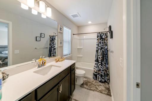 Upstairs full bath (Jack & Jill) for 2nd and 3rd bedrooms.
