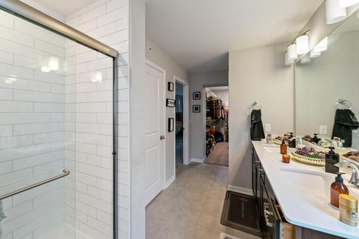 Primary bath has convenient stand up shower.