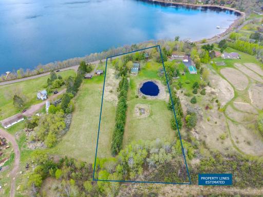 Nearly 6 acres with 300+ feet of frontage on Sand Lake