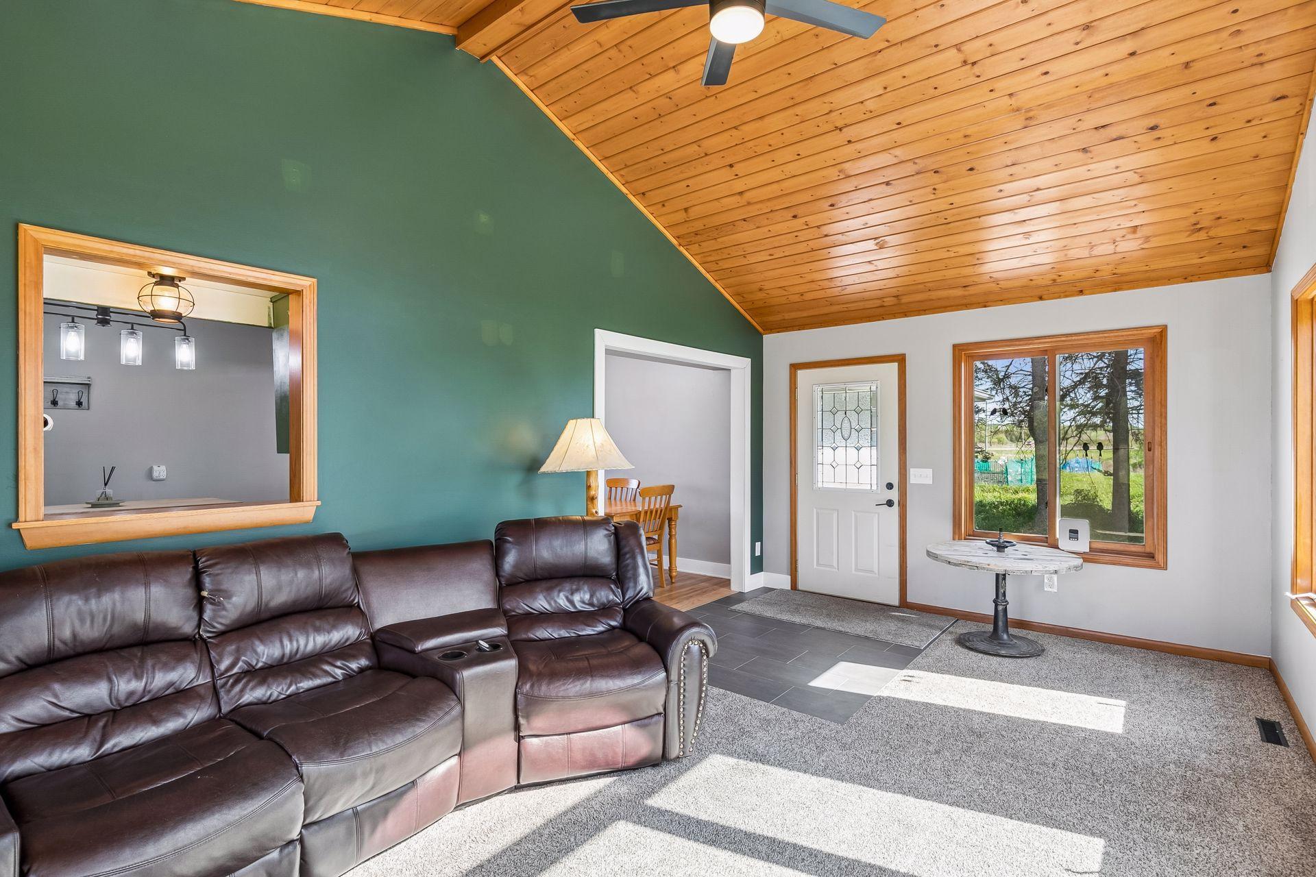Family room/sun room has walkout to backyard patio.