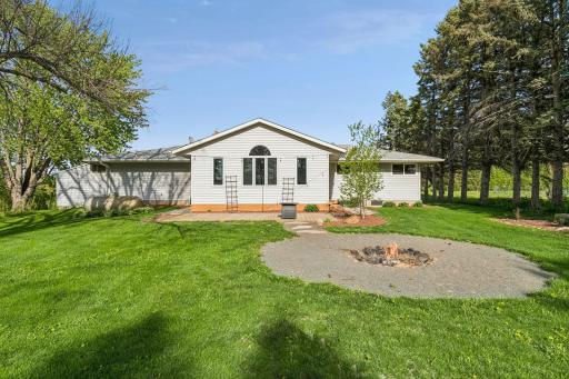Take in the beautiful western light on the backyard patio. Cozy up around the fire pit on those cool nights.