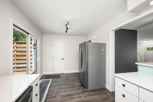 Sliding glass door to private deck off the kitchen