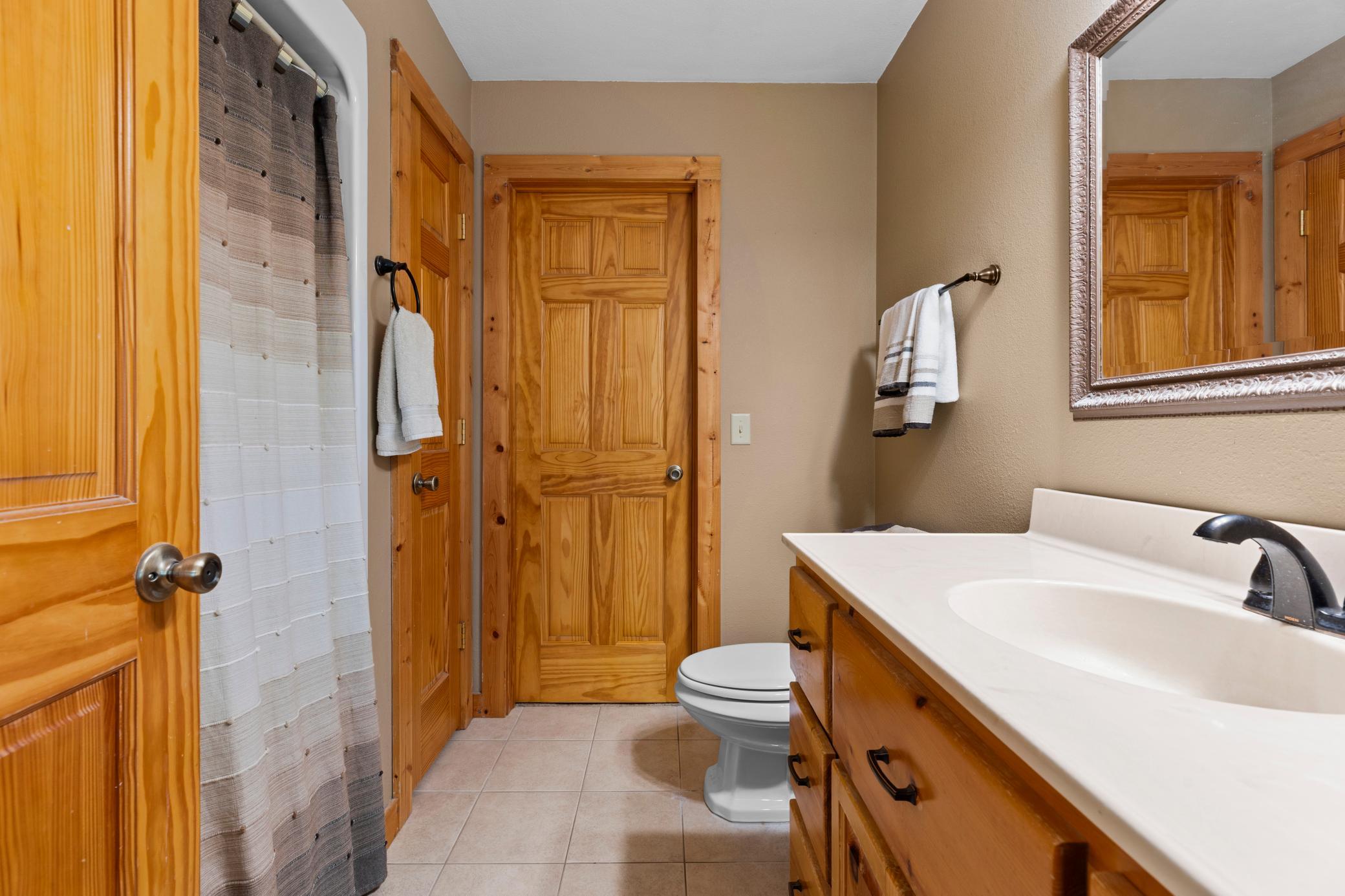 Primary Full Bathroom & Walk-In Closet