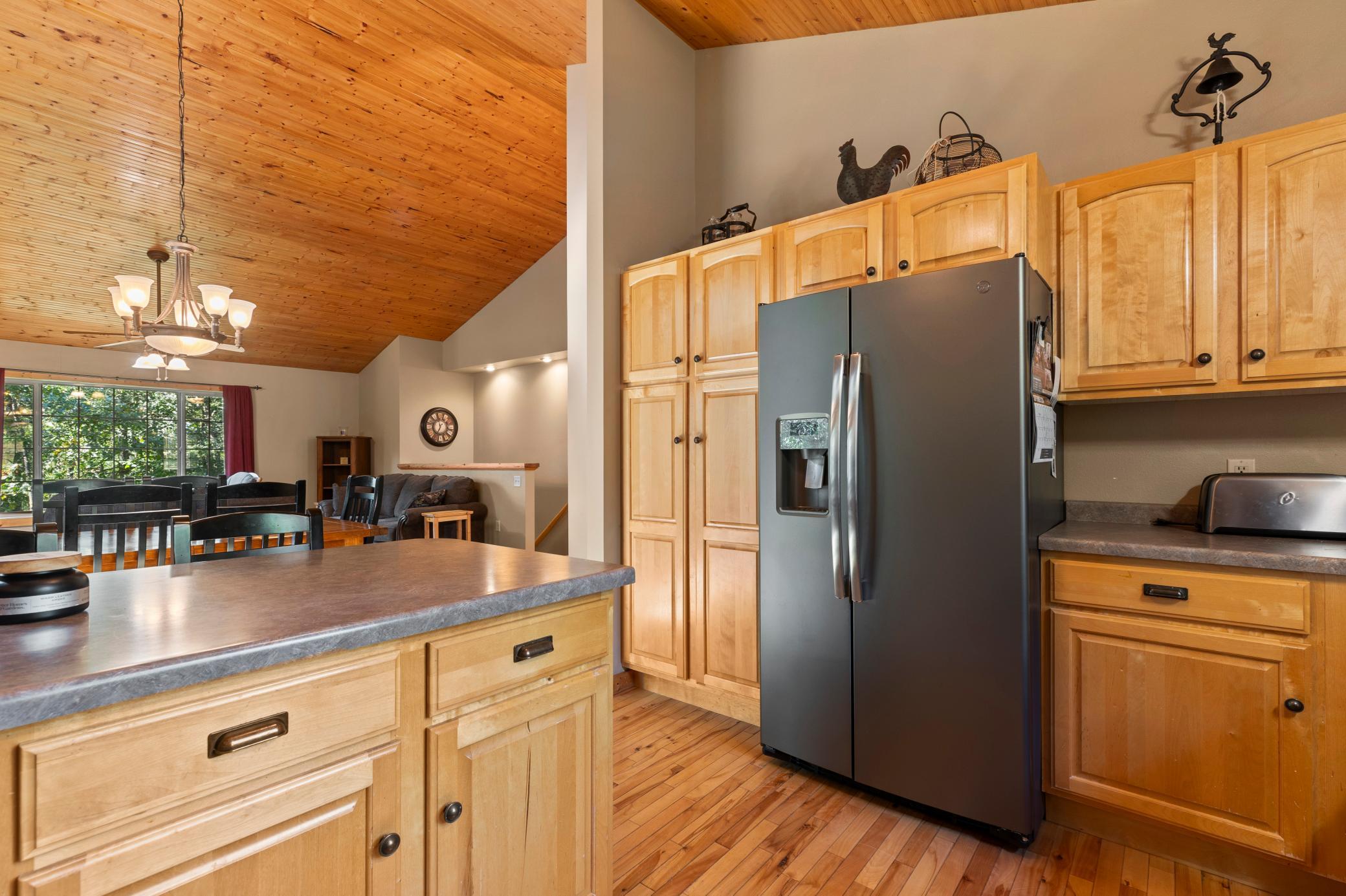 Beautiful maple cabinets in the kitchen.