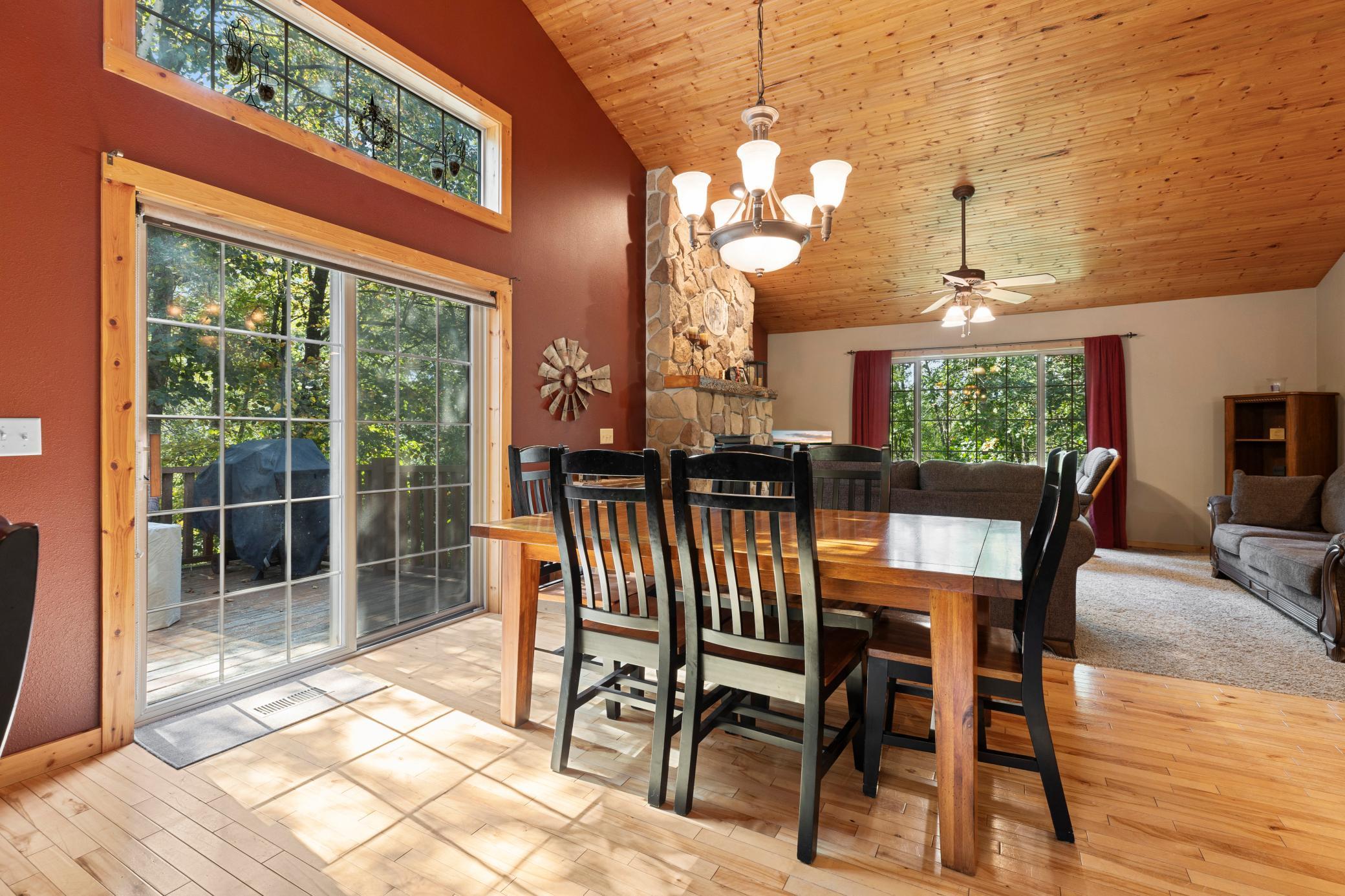 Dining Room looking into the living room...look at that floor to ceiling stone fireplace!