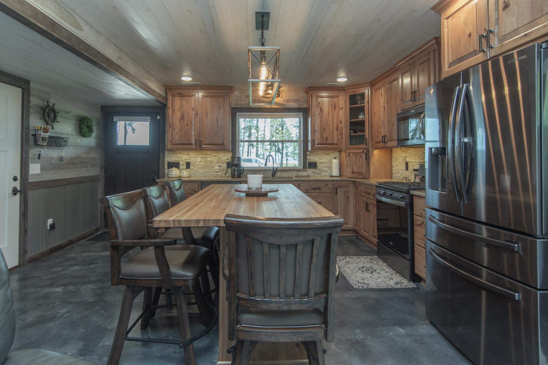 Hickory Cabinets and granite counter tops.