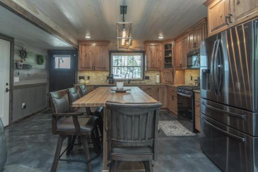 Hickory Cabinets and granite counter tops.