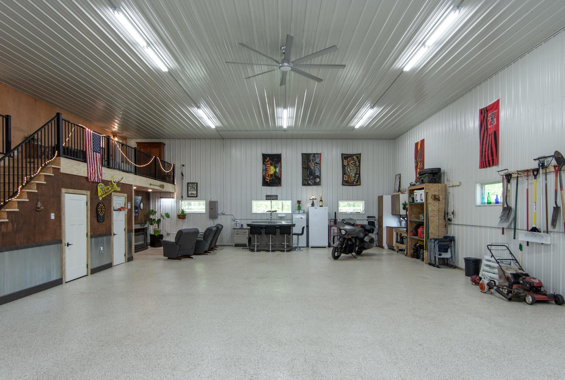37x60 Heated insulated garage with in-floor heat and floor drains.