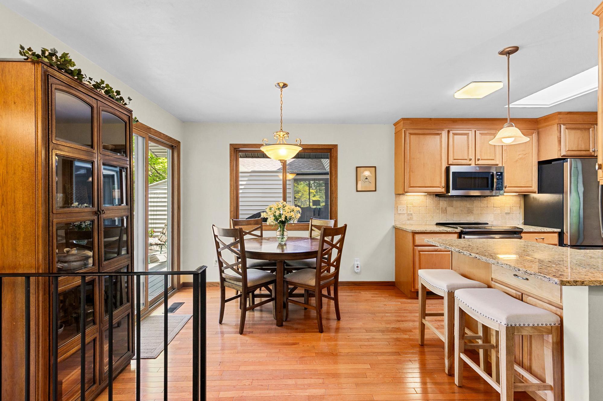 Dining space just off kitchen and entertainment sized deck proves to be ideal for spaces for the Holiday or Family gathering.
