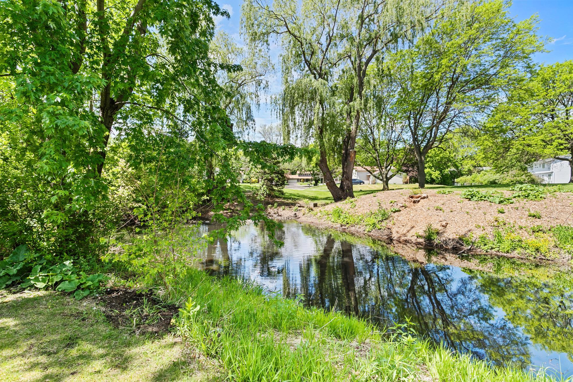 Set on the community’s premier lot, this residence and its surroundings offer an understated promise of tranquility, serenity, and seclusion.