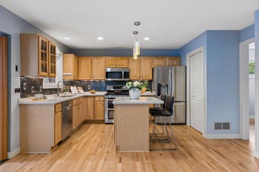 Maple woodwork throughout the home including the maple kitchen cabinetry.