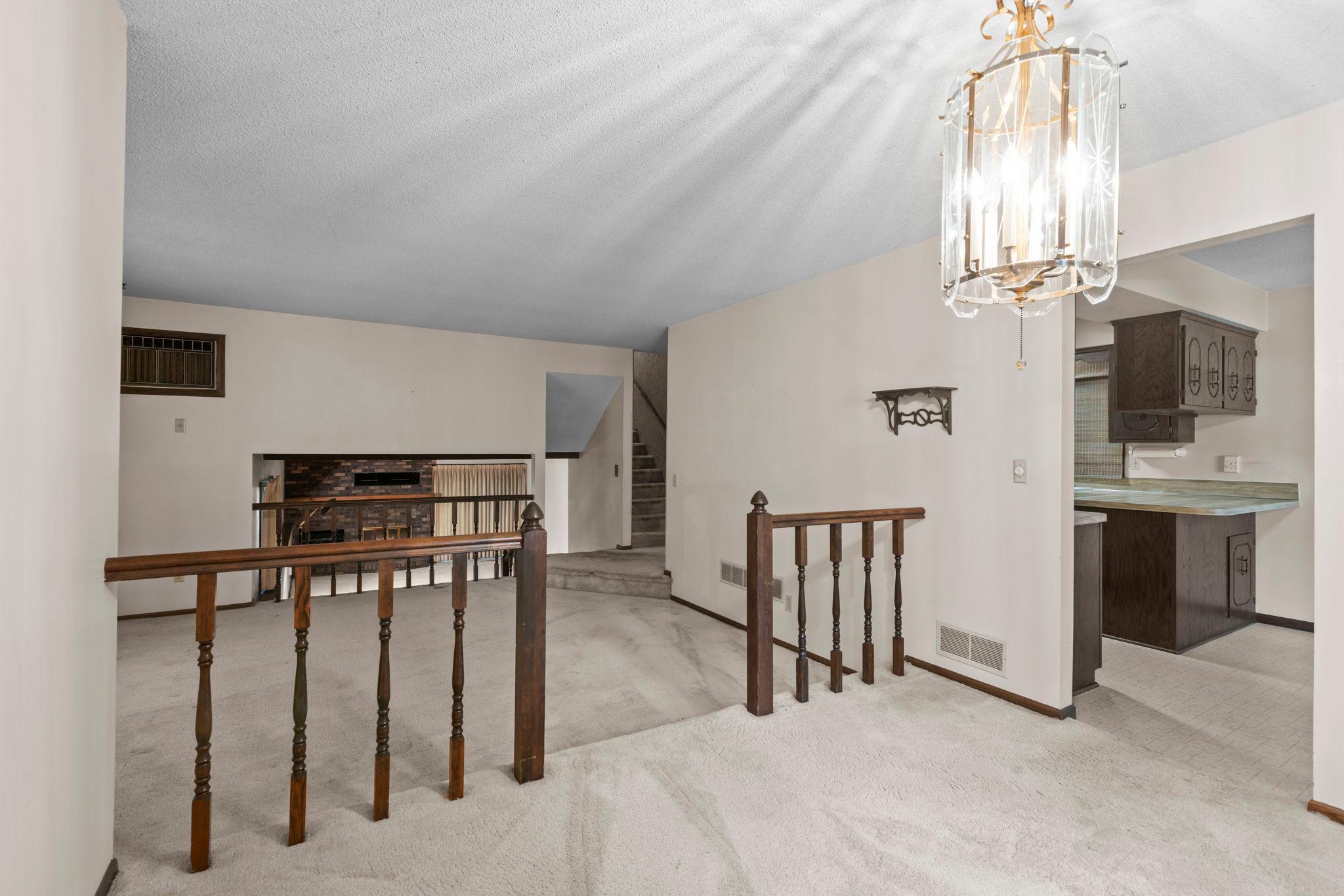Main level dining room with living room perspective.jpg