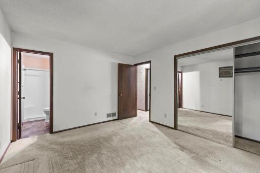 Upper level master bedroom with private three quarter bathroom.jpg
