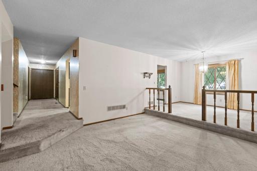 Main level living room with entry foyer pespective.jpg