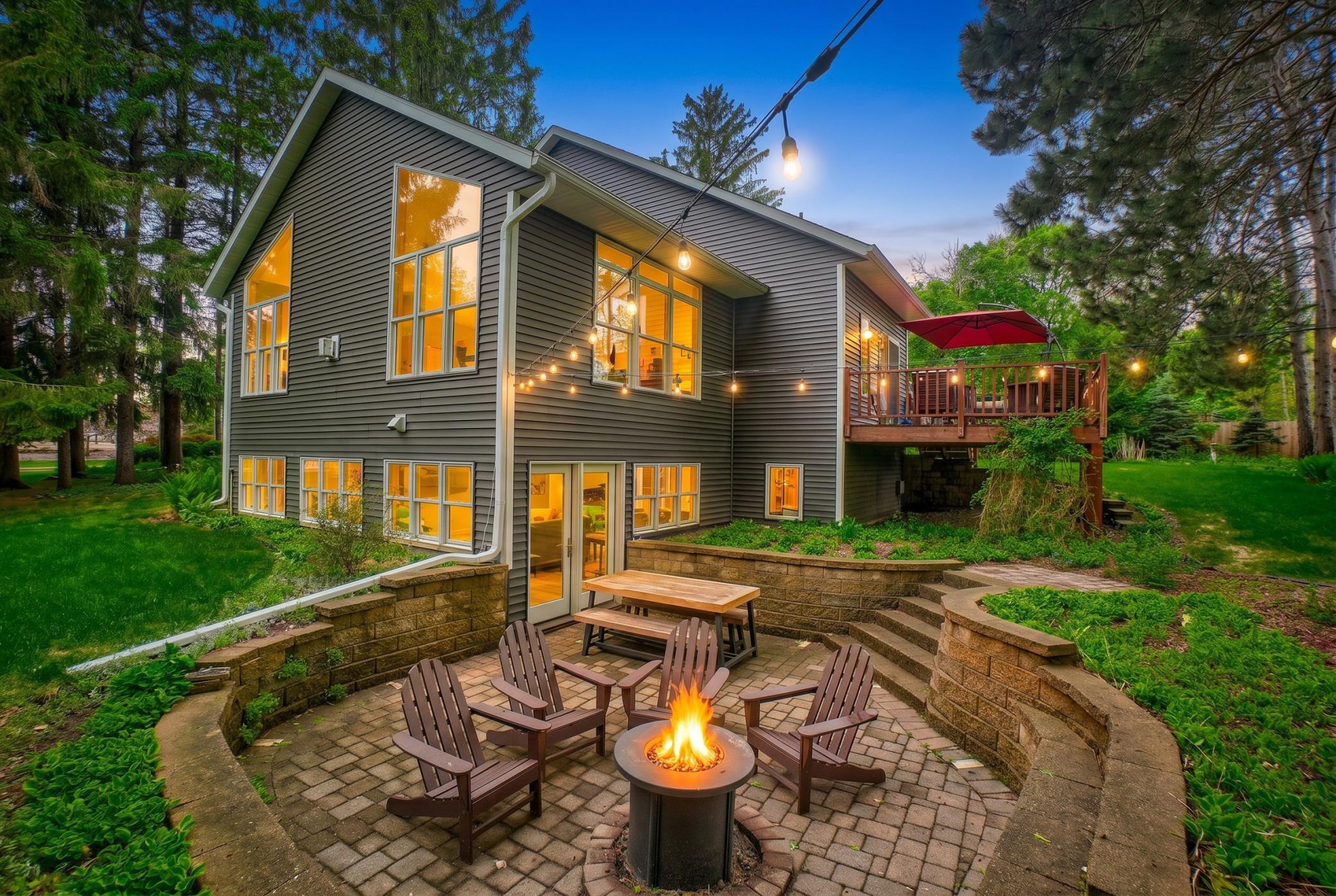 Relax on the stone patio around the firepit (virtual flame) and take in the lovely scenary.