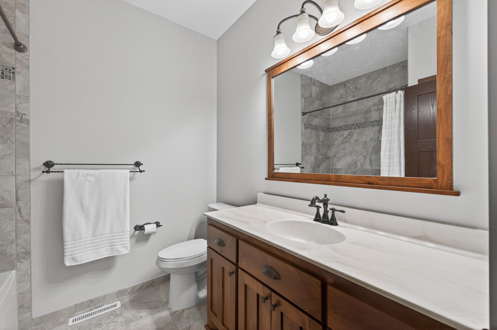 Another full bathroom on the main floor with quality finishes.