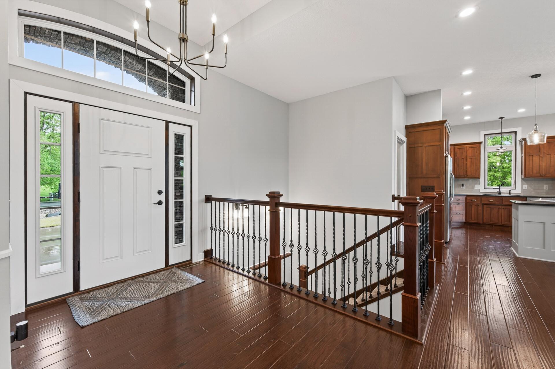Stunning entrance into this open floorplan executive rambler.