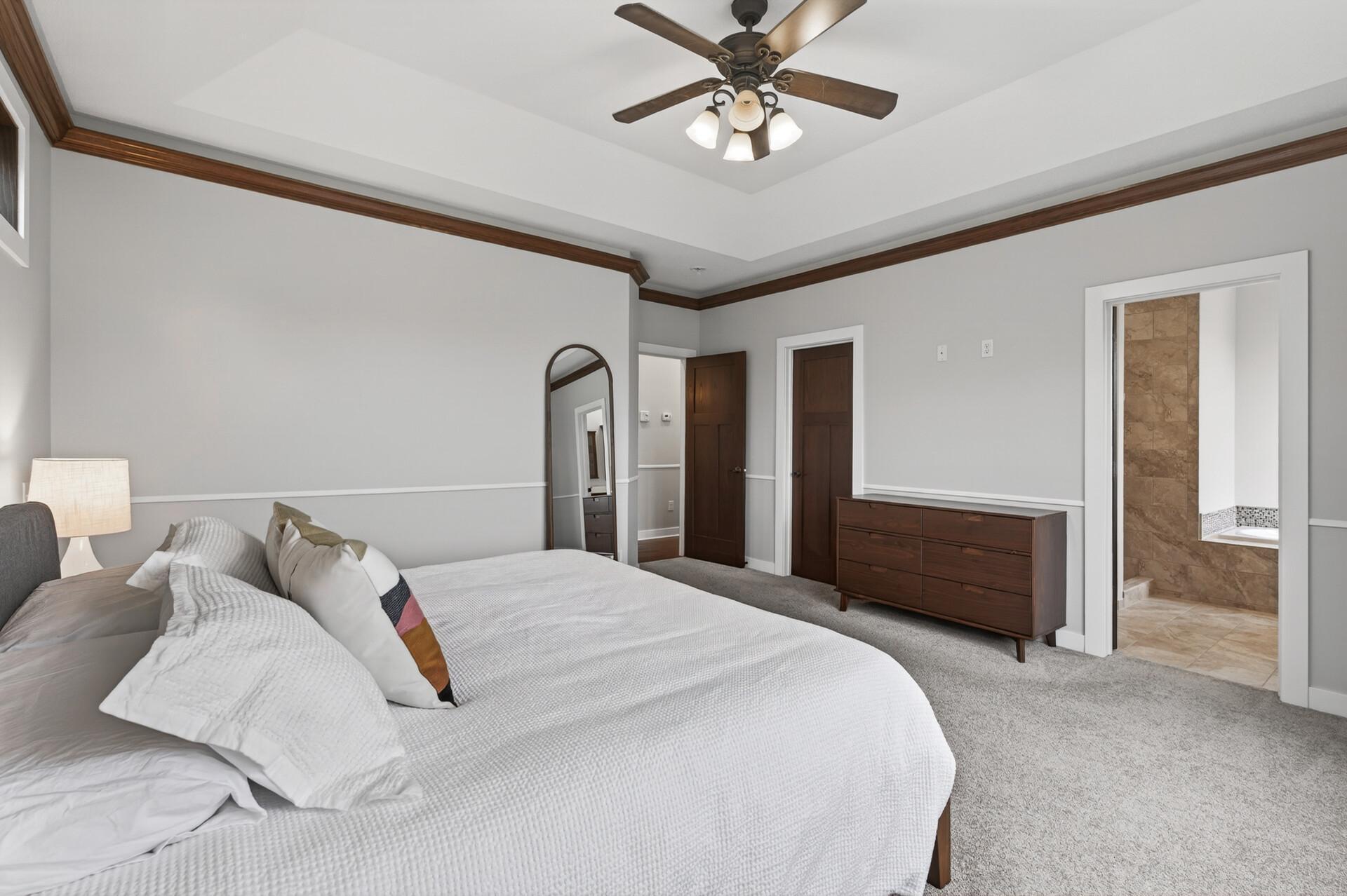 Large walk in closet and expertly appointed en suite bathroom.