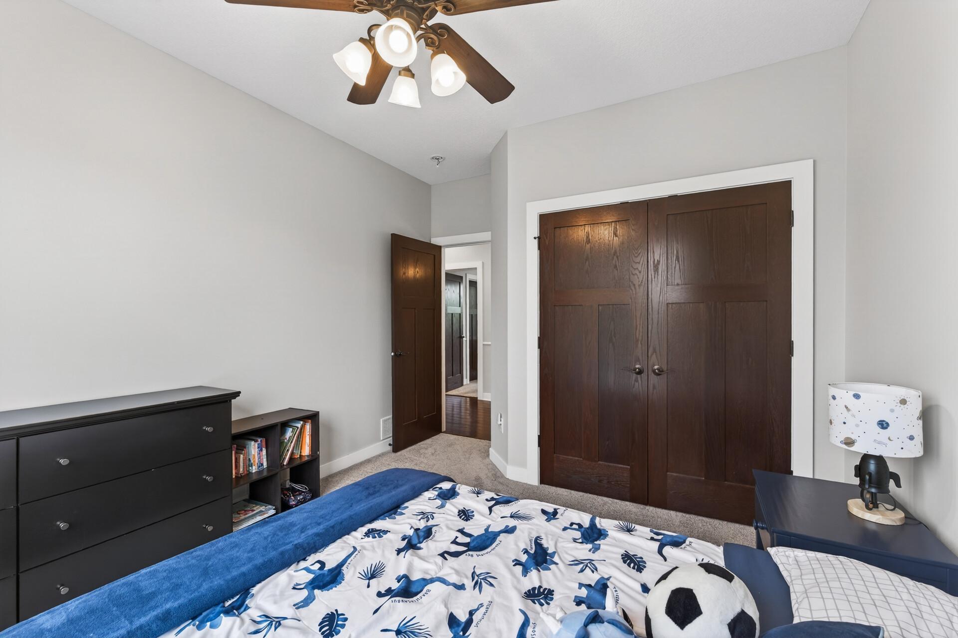Double closet doors with built in organization.