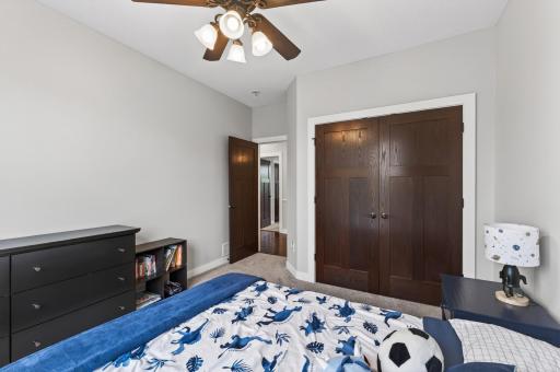 Double closet doors with built in organization.
