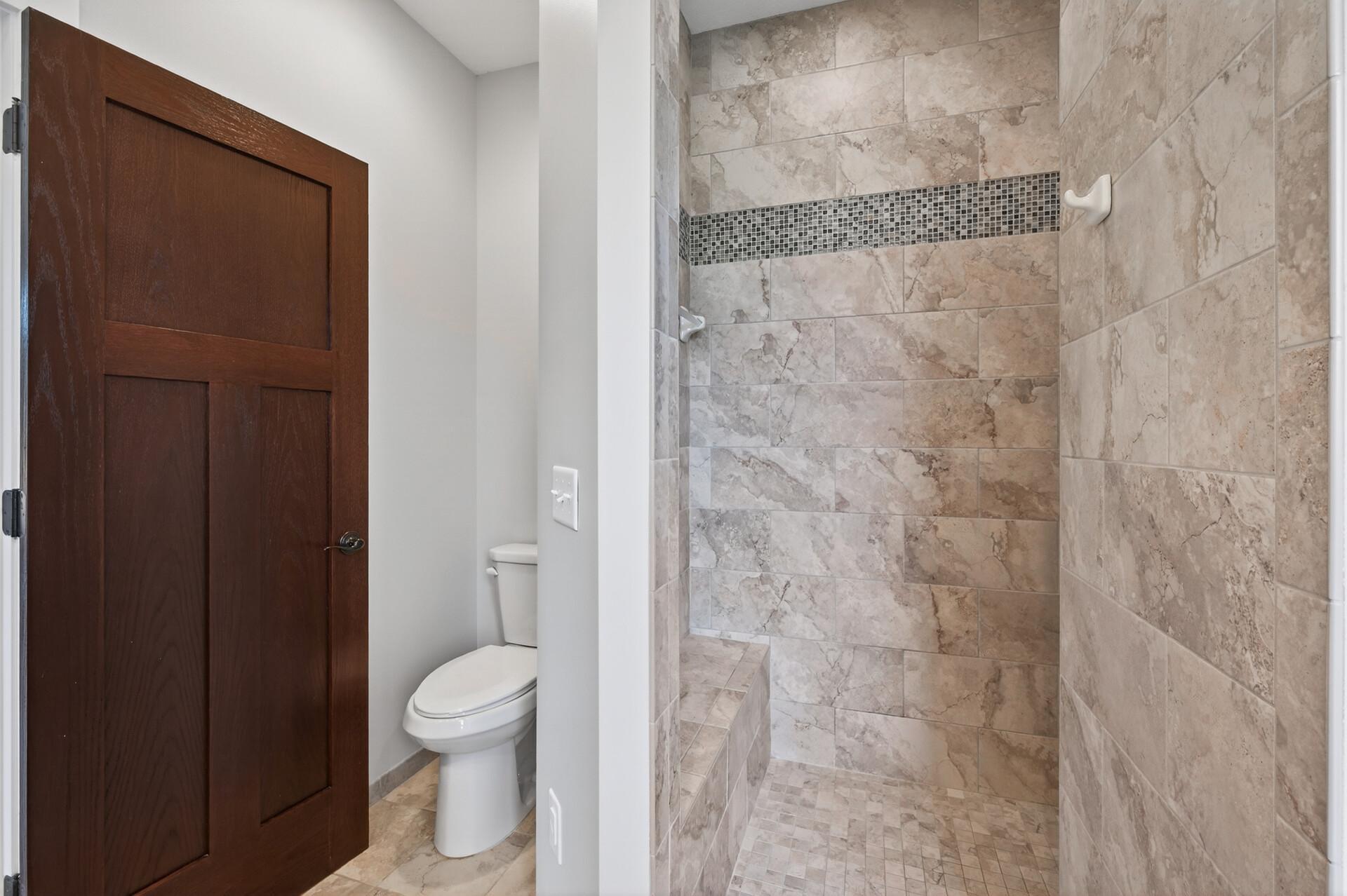 No more glass shower doors to clean!