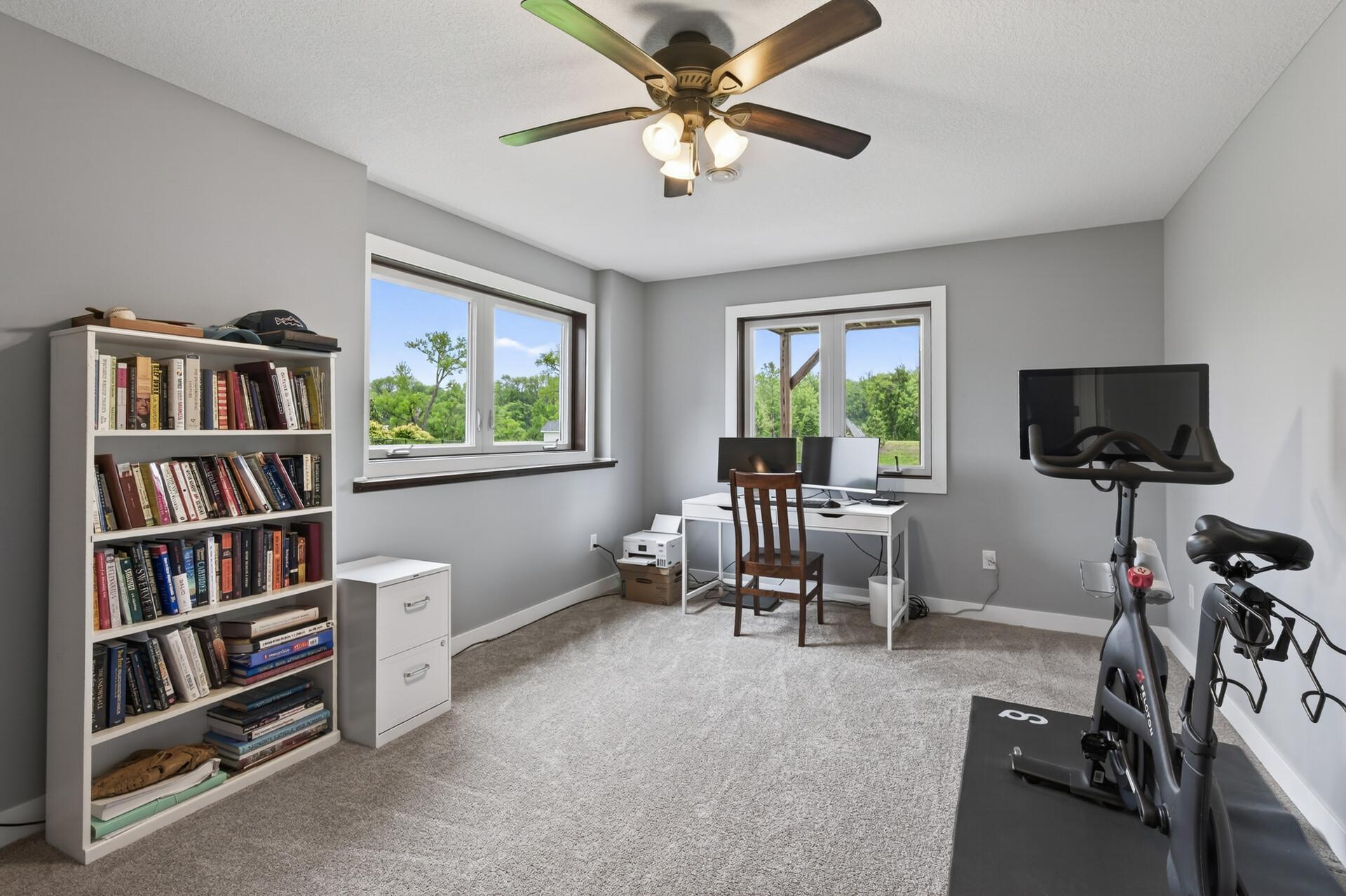 Yet another lower level bedroom with views and TWO walk in closets.