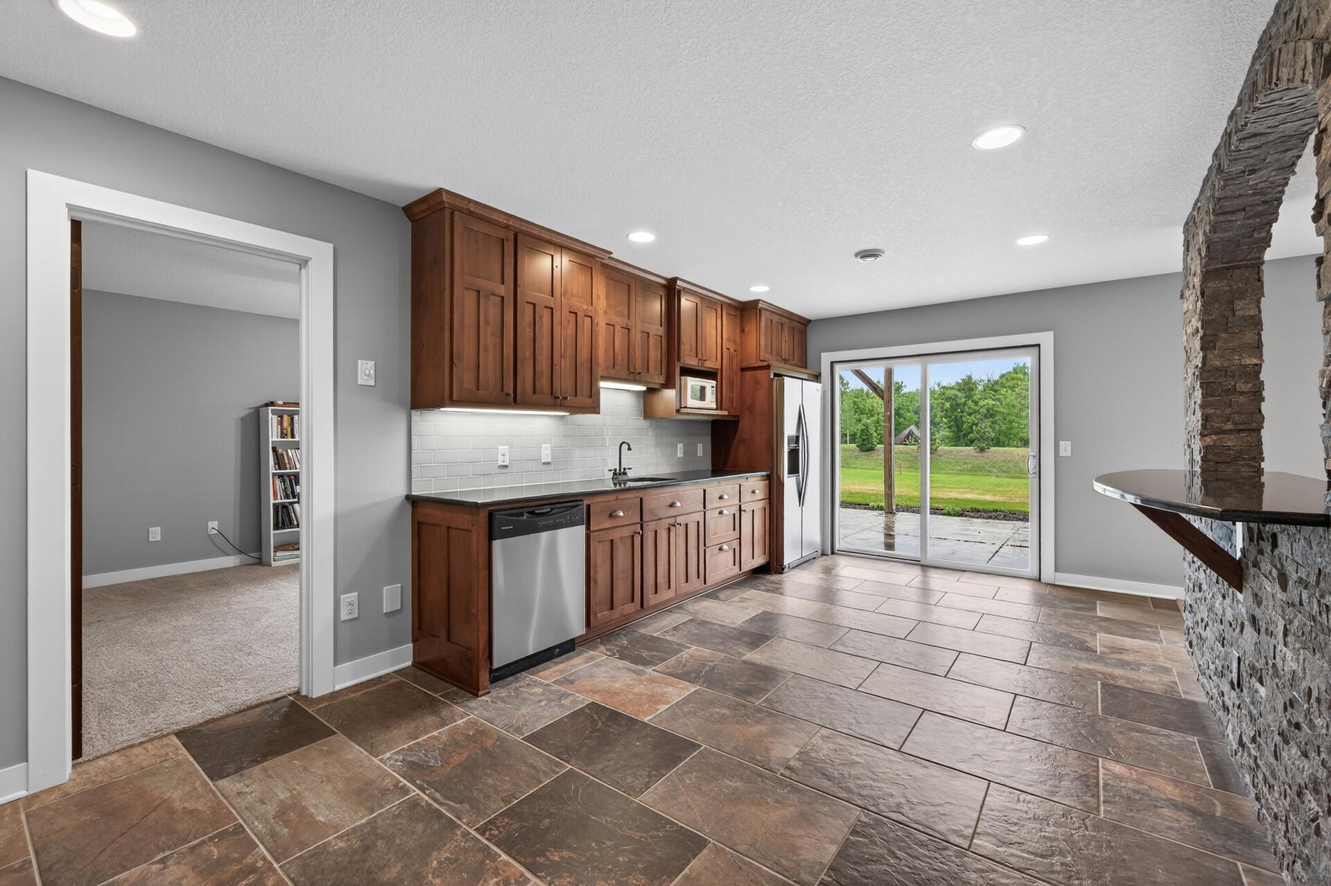 With easy walk out access to the backyard, the options are limitless.