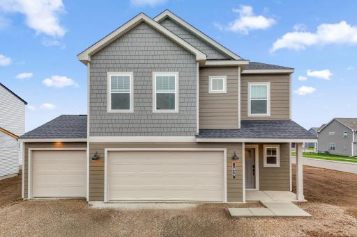 Welcome home to our newest collection - Origen Series by M/I Homes! Our Trenton B Floorplan has an impressive 3 car garage in our new Alder Glen Development! Actual home.