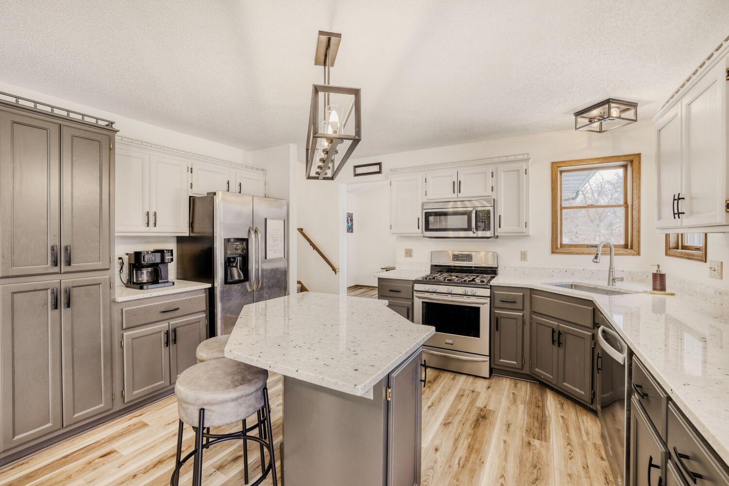 Another view of the kitchen with plenty of cupboard/counter space.